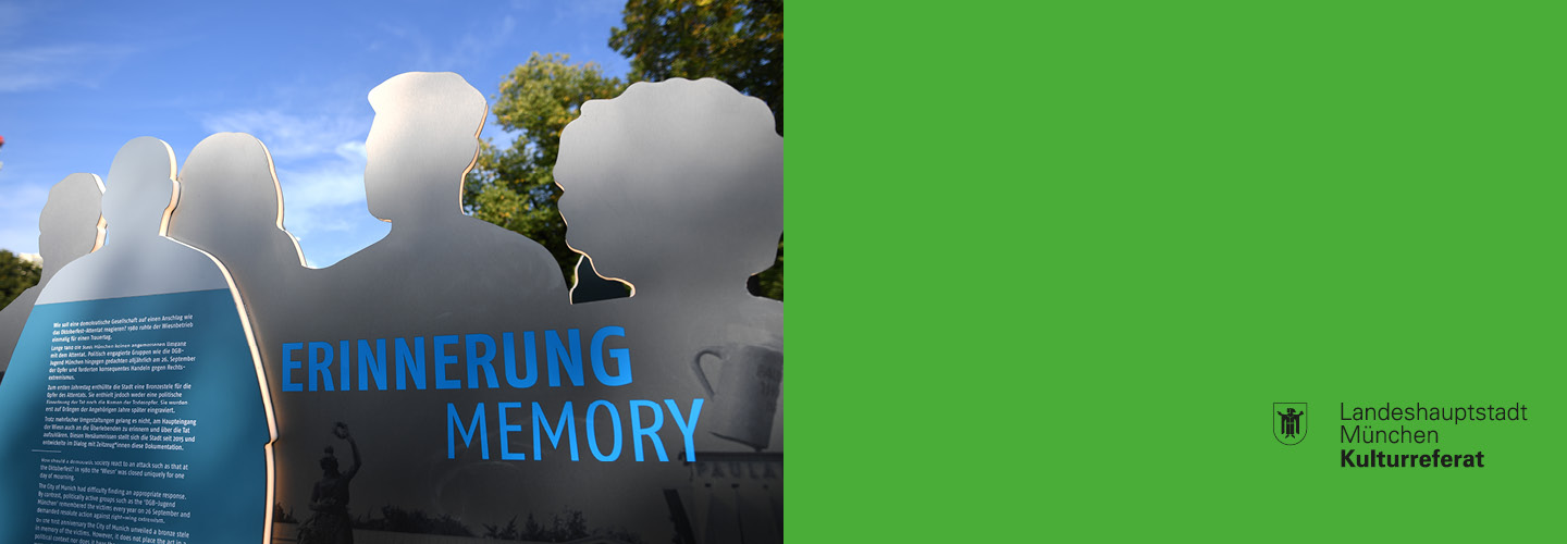 Slider image "Commemoration Sites" showing a picture of the documentary Oktoberfest-Attack at the main entrance to the Theresienwiese.